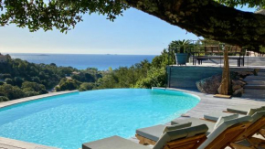 Superbe villa avec piscine chauffée et vue mer à Palombaggia